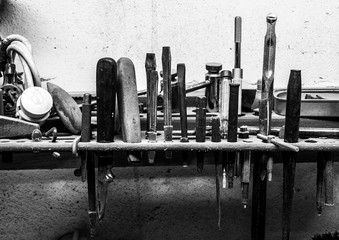Tools in a dusty used basement