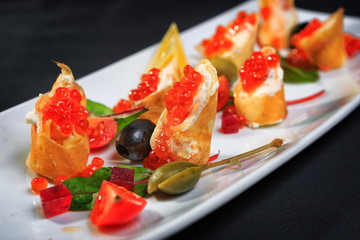 Pancakes with red caviar