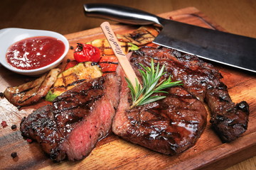 Meat steak on the wooden board