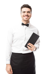Fototapeta na wymiar Young waiter with a menu