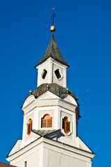 Fototapeta na wymiar typical bell tower of the european mountains