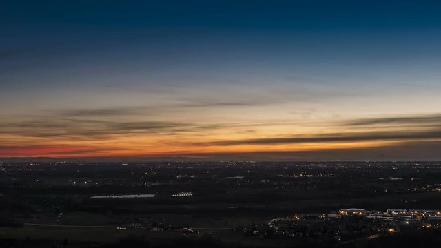 Timelapse of Milan city area and Po Valley, Italy at sunrise. Aerial View