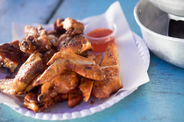 Grilled chicken at Thai street food market