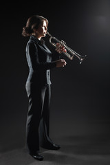 Trumpet player jazz musician playing brass instrument