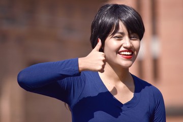Successful Hispanic Person Wearing A Wig