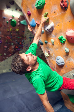 Rock climbing in the gym.