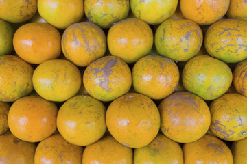 Tangerine stacked in layers.