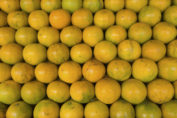 Tangerine stacked in layers.