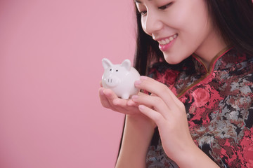 Little Piggy bank in hand.
