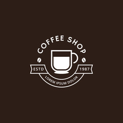 Coffee shop logo in white color. Coffee logo for coffee house or shop. Vector badge or logotype with cup. Cafe house logotype. Vector illustration