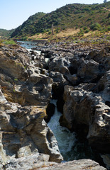 Pulo do Lobo (Wolf's leap) waterfall and cascade of river Guadiana, Alentejo, Portugal