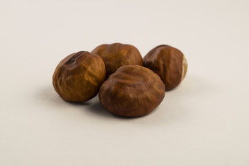 Fresh chestnuts on white background