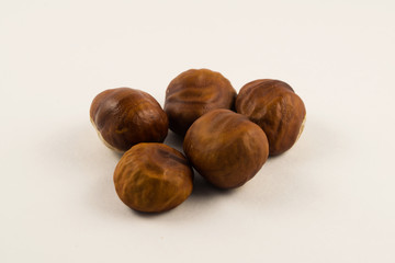 Fresh chestnuts on white background