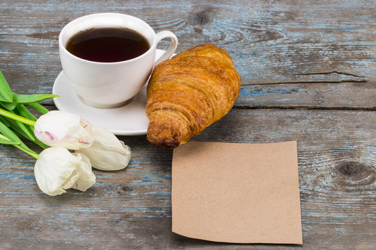 Breakfast for mother's day,Concept with flowers and gift card ,with empty space for a text