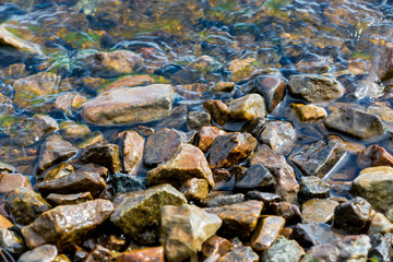 River stones in water