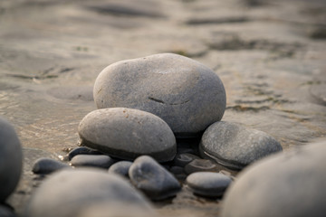 Fototapeta na wymiar The stones of Monknash Beach, Vale of Glamorgan, Wales, UK