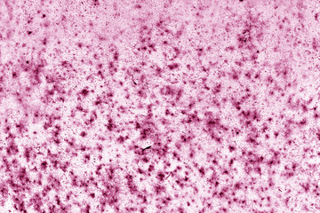 Rusty metal wall texture in pink color.