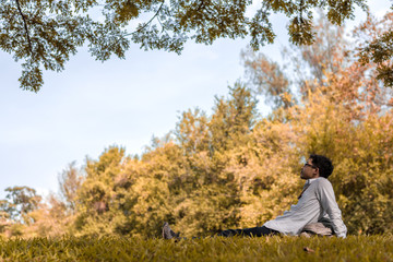 man relaxing in nature park.
