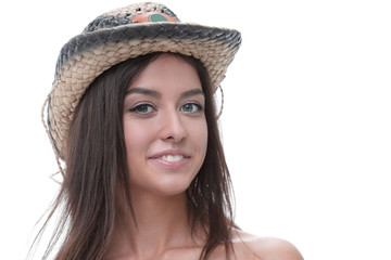 Portrait of a beautiful young woman in cowboy hat