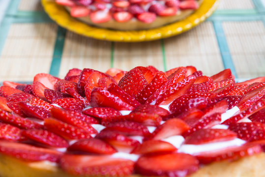 Strawberry tart. Homemade pie with whole pieces of strawberries and chantilly cream