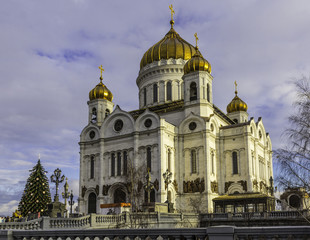 View of the Cathedral of Christ the Savior. Thaw in the middle of winter. The rays of the sun illuminated the Cathedral .