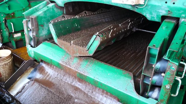 Shale shaker on an offshore oil rig separating the cutting from oil based mud

