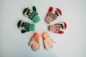 Stack of Handmade Warm Knitted Socks Scarfs Mittens From Rough Wool Yarn Brown Beige Grey. Close up. Winter Autumn Eco Fashion Kinfolk Style. Natural Materials