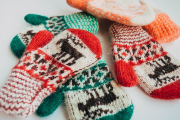 Stack of Handmade Warm Knitted Socks Scarfs Mittens From Rough Wool Yarn Brown Beige Grey. Close up. Winter Autumn Eco Fashion Kinfolk Style. Natural Materials