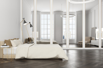 White bedroom interior, a TV set