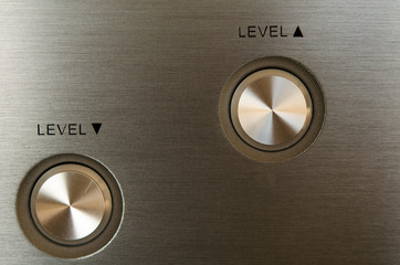 Close up of a high tech media preamplifier level buttons