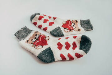 Handmade knitted socks for the cold season. View from above. Many different blue color socks.