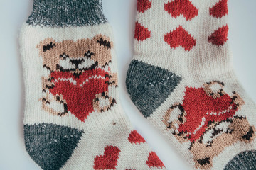 Handmade knitted socks for the cold season. View from above. Many different blue color socks.