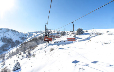Fototapeta na wymiar Snow-capped mountains at the ski resort