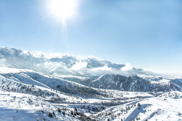 Beautiful Snow-covered mountains in winter in sunny weather