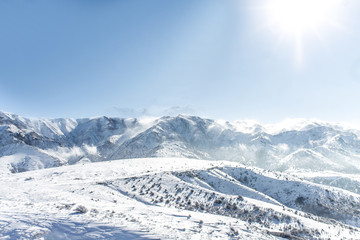 Fototapeta na wymiar Snow on a mountain slope