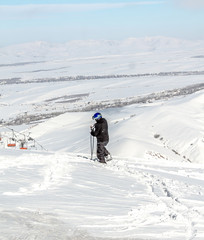 Fototapeta na wymiar Downhill skiing from the mountain