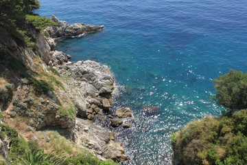 Fototapeta premium Rocks and golubaya transparent water, Dubrovnik Croatia
