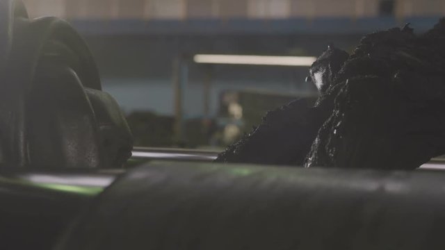 Components Drop into Roller Machine to Produce Tire Closeup