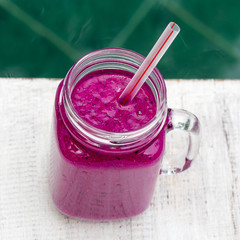 Fresh smoothies from a dragon fruit, banana, mango and papaya. Island Bali, Ubud, Indonesia