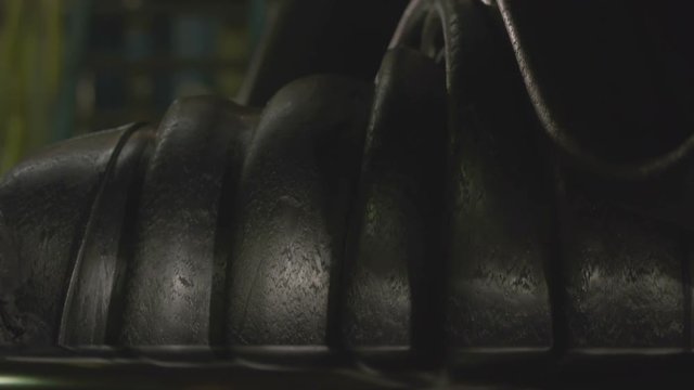 Rubber Material Drops into Roller Mechanism Close View
