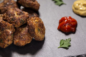 Slate slab with homemade Meatballs made from pork, beef and vegetables