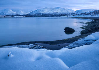 Blue hour lanscape before polar night in the village Lyngseidet on the north of Norway