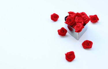 minimal style Small Red rose on White background,Top view,flat lay,Valentine's day romantic