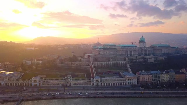 Budapest, Hungary - Aerial drone footage of Buda Castle Royal Palace with beautiful sunset and clouds