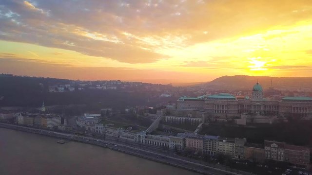 Budapest, Hungary - Aerial drone footage of Buda Castle Royal Palace with beautiful sunset and colorful sky