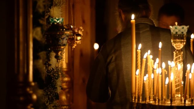 Wax candles in the church. The Russian Orthodox Church 