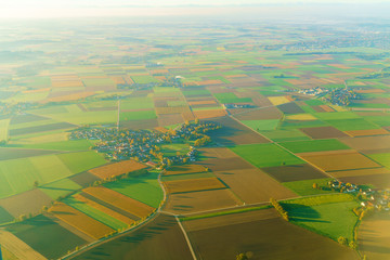 Aerial view of blurred background with beautiful fields in Bavaria, Germany