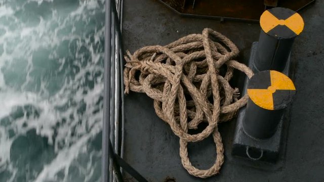 Large ferry boat with ropes on deck close-up
