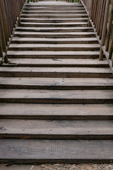 Fototapeta na wymiar wooden stairs to a bridge