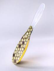 sealed single portion honey spoon